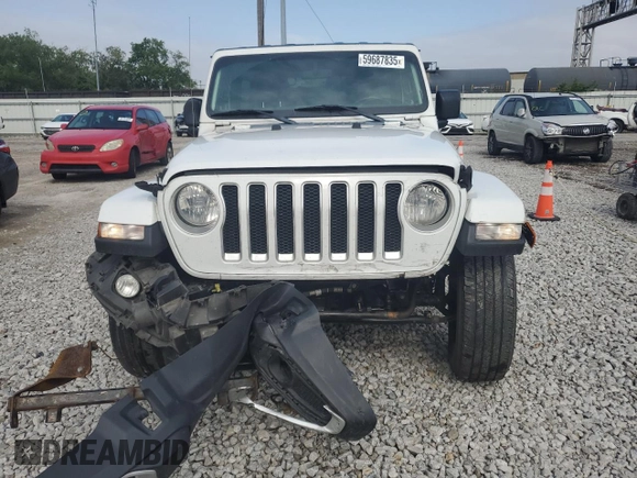 2019 Jeep Wrangler Unlimited Sahara с VIN 1C4HJXEG6KW580031, выставлен на аукционе Copart как лот 59687835 с пробегом 136 590 миль миль и Списание • Salvage title. История ставок и продаж доступна на DreamBid. Изображение 5.