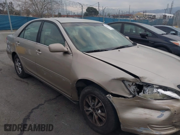 2004 Toyota Camry LE with VIN 4T1BF32K44U069081, listed as a IAAI auction lot 41460767 with 204,992 mi miles and . Bid and sale history available at carsss.com. Image 6.