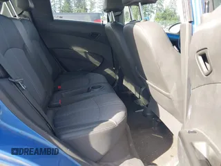 2015 Chevrolet Spark LS with VIN KL8CB6S94FC751401, listed as a IAAI auction lot 42032919 with 61,149 mi miles and . Bid and sale history available at DreamBid. Image 8.