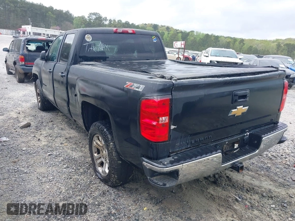 2015 Chevrolet Silverado 1500 LT with VIN 1GCVKREC3FZ170154, listed as a IAAI auction lot 41940479 with 200,965 mi miles. Bid and sale history available at carsss.com. Image 3.