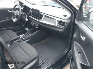 2023 Kia Rio S with VIN 3KPA24AD6PE594280, listed as a IAAI auction lot 41986833 with 7,688 mi miles. Bid and sale history available at carsss.com. Image 5.
