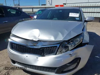 2013 Kia Optima LX z VIN KNAGM4A70D5414844, wystawiony jako IAAI lot #41774246 z przebiegiem 180 332 mil mil oraz . Historia ofert i sprzedaży dostępna na DreamBid. Obrazek 6.