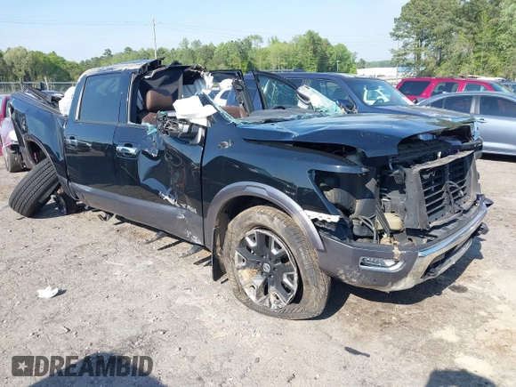 2021 Nissan Titan Pro-4X with VIN 1N6AA1ED4MN515673, listed as a IAAI auction lot 42028678 with 128,719 mi miles and . Bid and sale history available at DreamBid. Image 1.