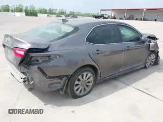 2020 Toyota Camry LE with VIN 4T1C11AK1LU505201, listed as a IAAI auction lot 42006393 with 106,526 mi miles and . Bid and sale history available at carsss.com. Image 4.