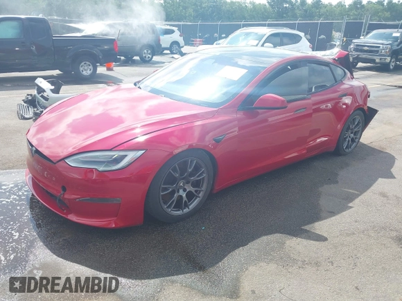 2021 Tesla Model S Plaid z VIN 5YJSA1E69MF439987, wystawiony jako IAAI lot #42496725 z przebiegiem 25 mil mil oraz . Historia ofert i sprzedaży dostępna na DreamBid. Obrazek 2.