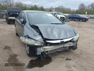 2011 Honda Civic LX with VIN 19XFA1F54BE032699, listed as a IAAI auction lot 42060272 with 197,905 mi miles and . Bid and sale history available at DreamBid. Image 6.