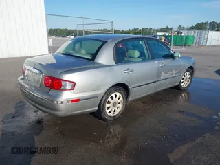 2004 Kia Amanti z VIN KNALD124645031511, wystawiony jako IAAI lot #42036901 z przebiegiem 218 926 mil mil oraz . Historia ofert i sprzedaży dostępna na DreamBid. Obrazek 4.