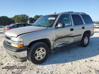 2005 Chevrolet Tahoe LT z VIN 1GNEC13T15J232270, wystawiony jako Copart lot #64440005 z przebiegiem 160 768 mil mil oraz Szkoda całkowita • Salvage title. Historia ofert i sprzedaży dostępna na DreamBid. Obrazek 1.