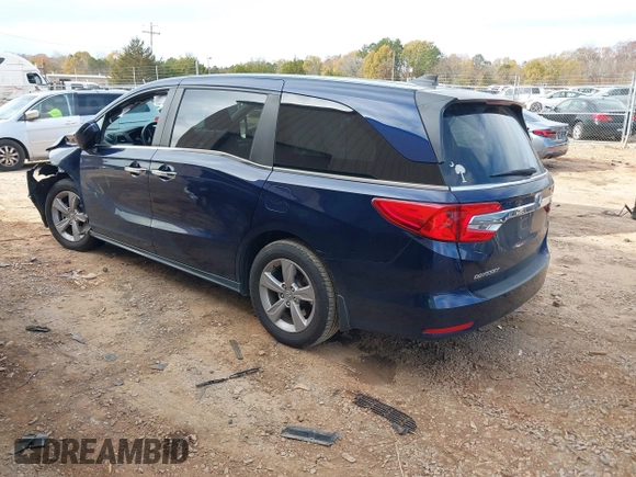 2019 Honda Odyssey EX-L with VIN 5FNRL6H72KB090503, listed as a IAAI auction lot 40958508 with 101,597 mi miles. Bid and sale history available at carsss.com. Image 3.