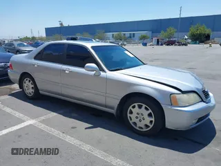 2004 Acura RL w/Navigation System с VIN JH4KA96614C004292, выставлен на аукционе IAAI как лот 42715722 с пробегом 140 463 миль миль и . История ставок и продаж доступна на DreamBid. Изображение 1.