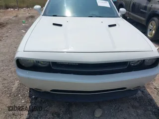 2012 Dodge Challenger SXT Plus z VIN 2C3CDYAG3CH168263, wystawiony jako IAAI lot #42283885 z przebiegiem 200 052 mil mil oraz . Historia ofert i sprzedaży dostępna na DreamBid. Obrazek 13.