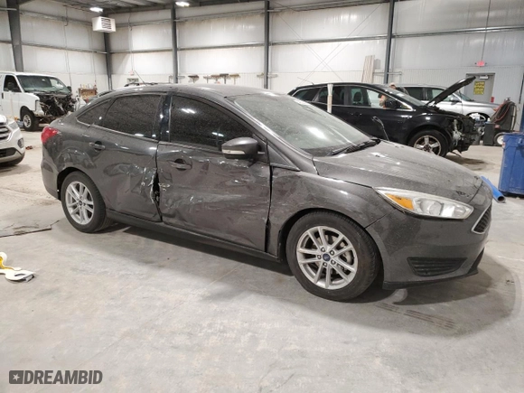 2017 Ford Focus SE with VIN 1FADP3F27HL302487, listed as a Copart auction lot 49329085 with 114,205 mi miles and Salvage Title. Bid and sale history available at carsss.com. Image 4.