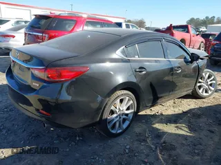 2017 Mazda Mazda6 Touring with VIN JM1GL1V52H1123952, listed as a IAAI auction lot 41453455 with 168,332 mi miles. Bid and sale history available at carsss.com. Image 4.