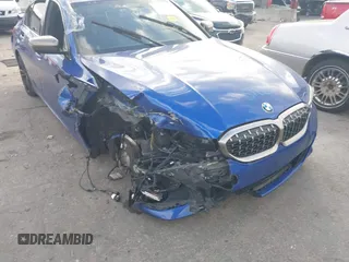 2020 BMW 3 Series M340i xDrive with VIN WBA5U9C00LA379345, listed as a IAAI auction lot 41256225 with 57,856 mi miles and . Bid and sale history available at DreamBid. Image 6.