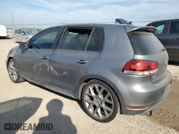 2013 Volkswagen GTI Driver's Edition with VIN WVWHD7AJXDW013669, listed as a Copart auction lot 61721474 with 210,857 mi miles and Clean title. Bid and sale history available at DreamBid. Image 2.