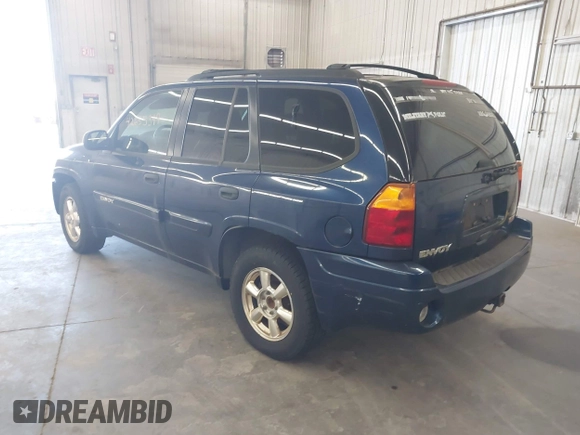 2003 GMC Envoy SLE with VIN 1GKDT13SX32365522, listed as a IAAI auction lot 42655399 with 210,765 mi miles and . Bid and sale history available at DreamBid. Image 3.