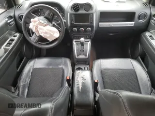 2014 Jeep Compass Latitude with VIN 1C4NJCEB5ED744997, listed as a Copart auction lot 87148424 with 124,408 mi miles and Salvage Title. Bid and sale history available at carsss.com. Image 8.