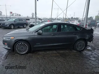 2017 Ford Fusion Titanium with VIN 3FA6P0SU8HR329570, listed as a IAAI auction lot 41773023 with 112,022 mi miles and . Bid and sale history available at DreamBid. Image 15.