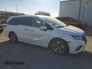 2020 Honda Odyssey Touring with VIN 5FNRL6H8XLB007622, listed as a Copart auction lot 76297494 with 83,452 mi miles and Salvage Title. Bid and sale history available at DreamBid. Image 4.