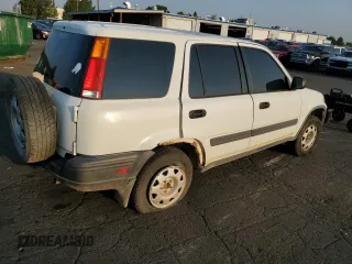 1999 Honda CR-V LX with VIN JHLRD1848XC027046, listed as a Copart auction lot 64091164 with 144,844 mi miles and Salvage Title. Bid and sale history available at carsss.com. Image 3.