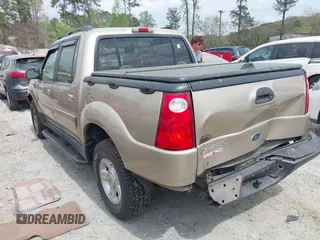 2002 Ford Explorer Sport Trac Value z VIN 1FMZU67E32UB39918, wystawiony jako IAAI lot #41937332 z przebiegiem 201 713 mil mil oraz . Historia ofert i sprzedaży dostępna na DreamBid. Obrazek 3.