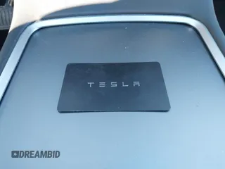 2024 Tesla Model Y Long Range with VIN 7SAYGAEE5RF201368, listed as a IAAI auction lot 41248963 with Not Provided miles and . Bid and sale history available at DreamBid. Image 11.