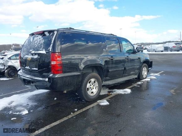 2014 Chevrolet Suburban LT with VIN 1GNSKJE79ER112014, listed as a IAAI auction lot 41384706 with 257,484 mi miles. Bid and sale history available at carsss.com. Image 4.