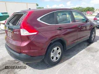 2014 Honda CR-V LX with VIN 5J6RM3H30EL041952, listed as a IAAI auction lot 42202991 with 72,223 mi miles. Bid and sale history available at carsss.com. Image 4.