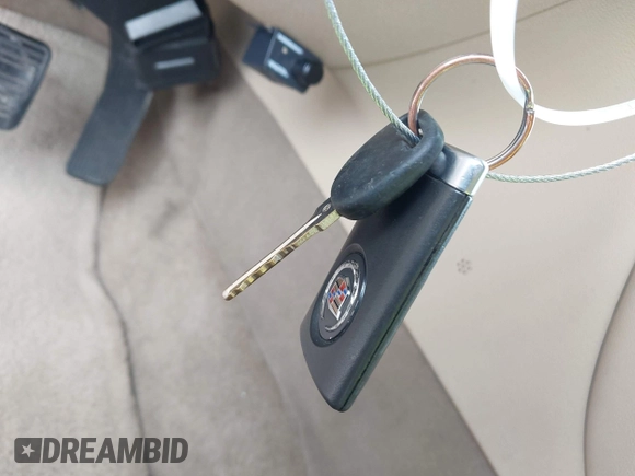 2010 Cadillac Escalade EXT z VIN 3GYVKLEF4AG171775, wystawiony jako IAAI lot #42413511 z przebiegiem Nie podano mil oraz . Historia ofert i sprzedaży dostępna na DreamBid. Obrazek 11.
