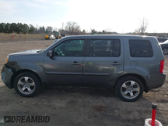 2012 Honda Pilot EX-L with VIN 5FNYF4H50CB074243, listed as a IAAI auction lot 41881319 with 167,727 mi miles and . Bid and sale history available at DreamBid. Image 14.