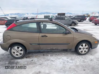 2000 Ford Focus ZX3 with VIN 3FAFP3137YR246156, listed as a IAAI auction lot 41330476 with 209,212 mi miles and . Bid and sale history available at DreamBid. Image 13.