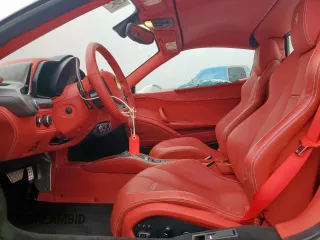 2014 Ferrari 458 Italia z VIN ZFF68NHA1E0198612, wystawiony jako Copart lot #54941365 z przebiegiem 4 506 mil mil oraz Szkoda całkowita • Salvage title. Historia ofert i sprzedaży dostępna na DreamBid. Obrazek 7.