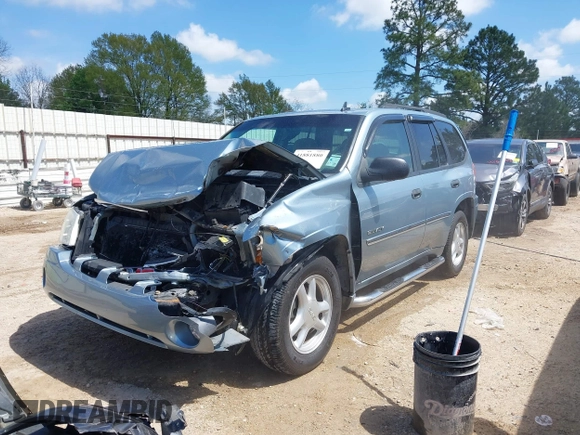 2006 GMC Envoy SLE with VIN 1GKDS13S362310613, listed as a IAAI auction lot 41881880 with 202,893 mi miles. Bid and sale history available at carsss.com. Image 17.