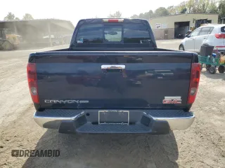 2011 GMC Canyon SLE1 with VIN 1GTH6MFE8B8102114, listed as a Copart auction lot 74137234 with 150,598 mi miles and Salvage Title. Bid and sale history available at carsss.com. Image 6.