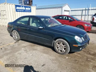 2003 Mercedes-Benz E-Class 3.2L with VIN WDBUF65J53A101021, listed as a Copart auction lot 73015774 with 242,812 mi miles and Clean Title. Bid and sale history available at carsss.com. Image 4.