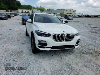 2021 BMW X5 xDrive40i z VIN 5UXCR6C07M9H21128, wystawiony jako Copart lot #54084915 z przebiegiem 26 966 mil mil oraz Szkody całkowita. Historia ofert i sprzedaży dostępna na DreamBid. Obrazek 14.