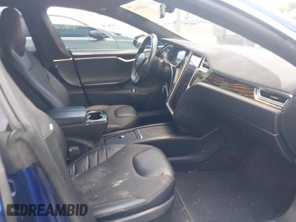 2016 Tesla Model S 70 with VIN 5YJSA1E17GF149479, listed as a IAAI auction lot 42609734 with 175,007 mi miles and . Bid and sale history available at DreamBid. Image 5.
