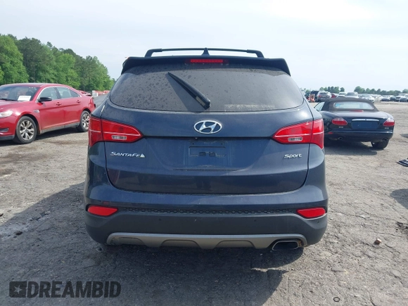 2016 Hyundai Santa Fe z VIN 5XYZU3LB4GG308030, wystawiony jako IAAI lot #42102832 z przebiegiem Nie podano mil oraz . Historia ofert i sprzedaży dostępna na DreamBid. Obrazek 15.