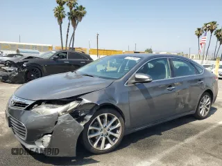 2013 Toyota Avalon XLE with VIN 4T1BK1EB0DU034680, listed as a Copart auction lot 57712555 with 106,098 mi miles and Salvage title. Bid and sale history available at DreamBid. Image 1.