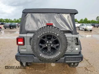 2021 Jeep Wrangler Unlimited Willys with VIN 1C4HJXDM6MW628041, listed as a Copart auction lot 58548475 with 22,697 mi miles and Salvage title. Bid and sale history available at DreamBid. Image 7.