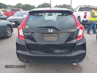 2020 Honda Fit LX z VIN 3HGGK5H40LM717305, wystawiony jako IAAI lot #42093169 z przebiegiem 69 665 mil mil oraz . Historia ofert i sprzedaży dostępna na DreamBid. Obrazek 16.