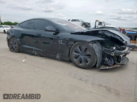 2023 Tesla Model S with VIN 5YJSA1E59PF512318, listed as a Copart auction lot 58377895 with 34,402 mi miles and Salvage title. Bid and sale history available at DreamBid. Image 4.
