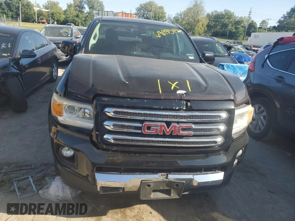 2015 GMC Canyon 4WD SLE with VIN 1GTG6BE37F1127911, listed as a Copart auction lot 68995134 with 117,375 mi miles and Salvage Title. Bid and sale history available at carsss.com. Image 5.