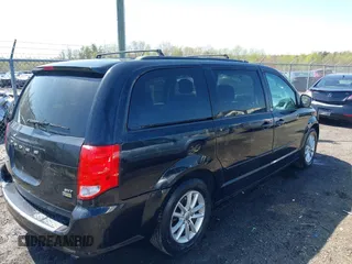2015 Dodge Grand Caravan SXT with VIN 2C4RDGCG6FR548774, listed as a IAAI auction lot 41901232 with 141,589 mi miles and . Bid and sale history available at DreamBid. Image 4.
