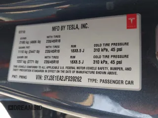 2018 Tesla Model 3 Long Range Battery z VIN 5YJ3E1EA2JF039262, wystawiony jako IAAI lot #42463443 z przebiegiem 77 482 mil mil oraz . Historia ofert i sprzedaży dostępna na DreamBid. Obrazek 9.