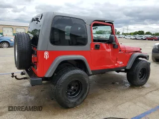 2005 Jeep Wrangler Sport z VIN 1J4FA49S75P317995, wystawiony jako Copart lot #58060055 z przebiegiem 189 332 mil mil oraz Szkoda całkowita • Salvage title. Historia ofert i sprzedaży dostępna na DreamBid. Obrazek 3.