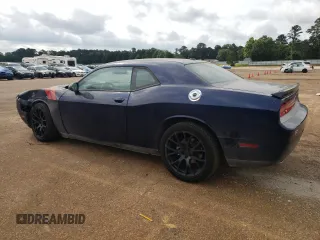 2013 Dodge Challenger SXT z VIN 2C3CDYAG3DH578949, wystawiony jako Copart lot #54664815 z przebiegiem 205 376 mil mil oraz Szkody całkowita. Historia ofert i sprzedaży dostępna na DreamBid. Obrazek 2.