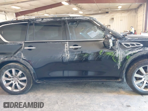 2012 Infiniti QX56 8-passenger with VIN JN8AZ2NC8C9317148, listed as a IAAI auction lot 42232551 with Not provided miles and . Bid and sale history available at DreamBid. Image 12.