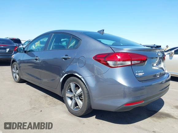 2018 Kia Forte LX with VIN 3KPFL4A77JE220538, listed as a IAAI auction lot 42095964 with 98,977 mi miles and . Bid and sale history available at DreamBid. Image 3.