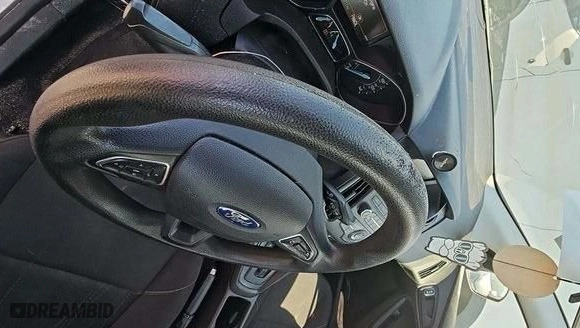 2016 Ford Focus S with VIN 1FADP3E29GL322417, listed as a IAAI auction lot 41982032 with 104,217 mi miles. Bid and sale history available at carsss.com. Image 1.